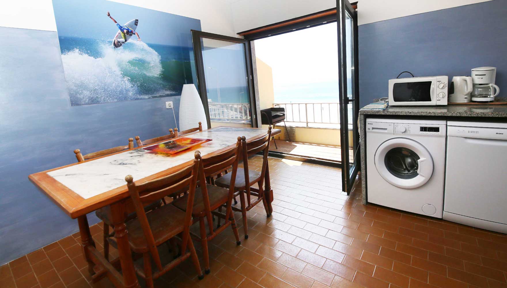 cozinha com a nova janela panorâmica e deck externo